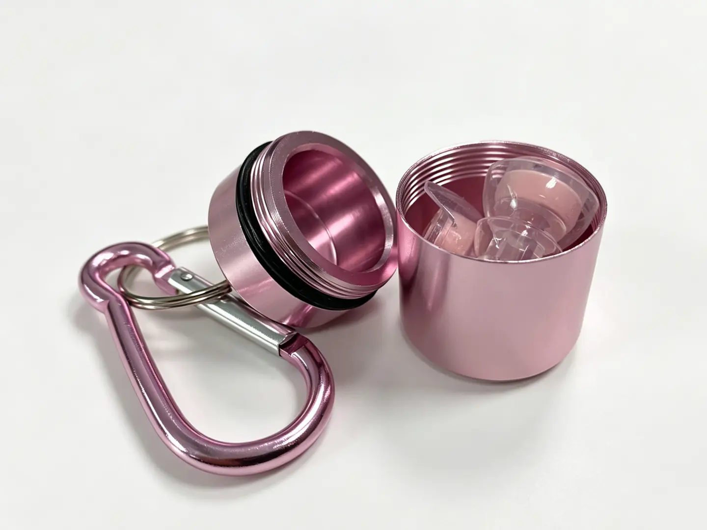 Open pink metal Ear Candy carry case